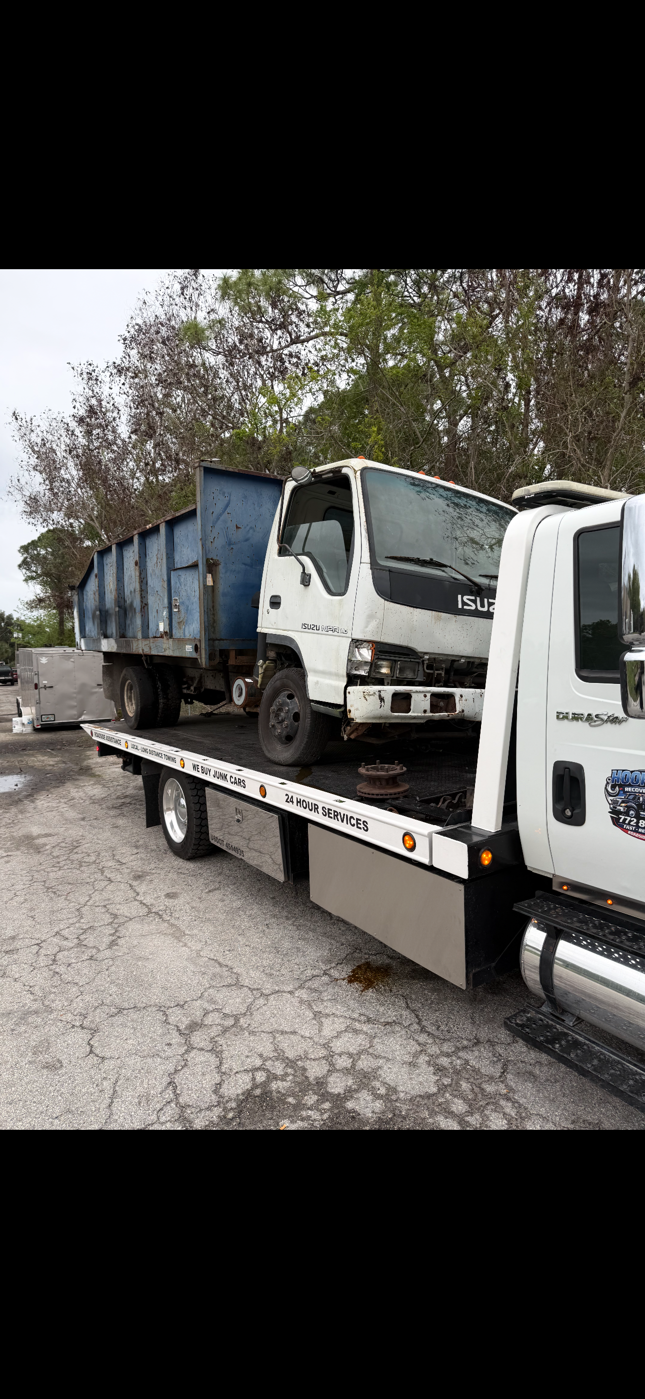 Heavy duty towing and dump truck transport by Hook and Haul Recovery